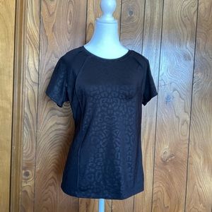 NWOT FILA sport size medium black leopard pattern